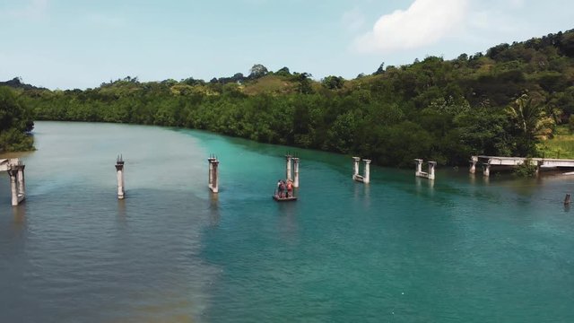 Crossing the river using rope and floater.