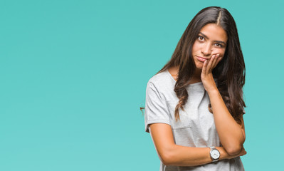 Young beautiful arab woman over isolated background thinking looking tired and bored with...