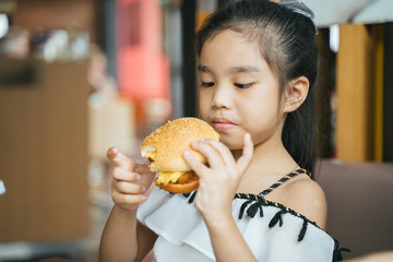 asian Children eat chicken cheese Hamburger Food Court