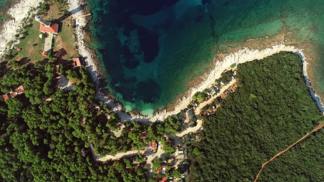 High aerial view of Veli Rat lighthouse and bay on island Dugi Otok in Croatia.