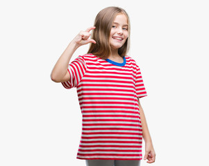 Fototapeta premium Young beautiful girl over isolated background smiling and confident gesturing with hand doing size sign with fingers while looking and the camera. Measure concept.