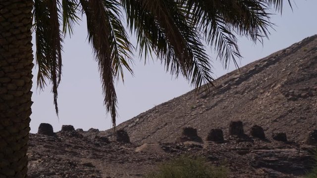 Ancient tombstones on a graveyard in the rural Sultanate of Oman.
