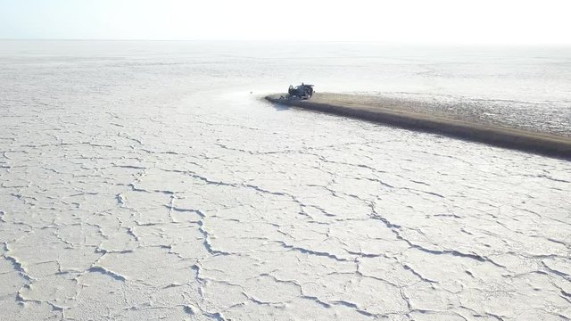 Somewhere in nowhere, somewhere in  the end of the world, somewhere in the white color, salt lake.
Somewhere in nowhere, somewhere in  the end of the world, somewhere in the white color, salt lake.
