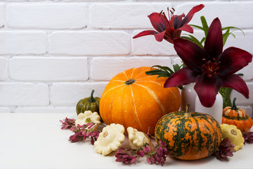 Thanksgiving centerpiece with burgundy red lily