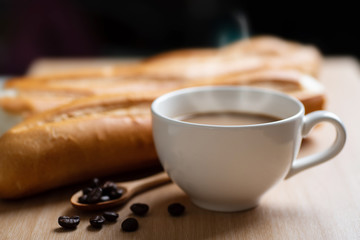 Cup of coffee and baguette french bread