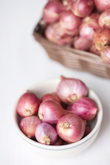 Red shallot onion in a bowl, herb and spice, food ingredient