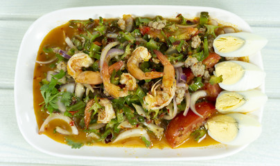 Wings Bean Spicy Salad. thai foods. white wooden backdrop. Top view. Copy Space..