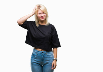 Fototapeta premium Young beautiful blonde woman over isolated background confuse and wonder about question. Uncertain with doubt, thinking with hand on head. Pensive concept.
