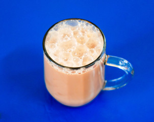 Cup of famous Malaysia drink known as teh tarik or milk tea