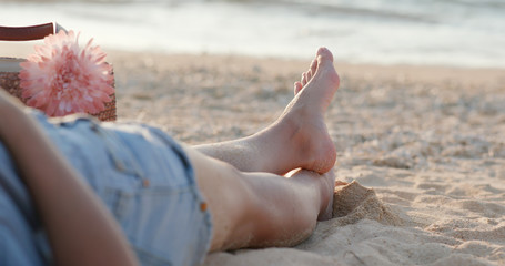 Woman  lying on the beach