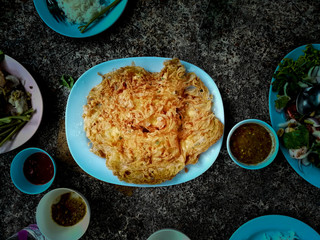 Omelet golden yellow on the table.