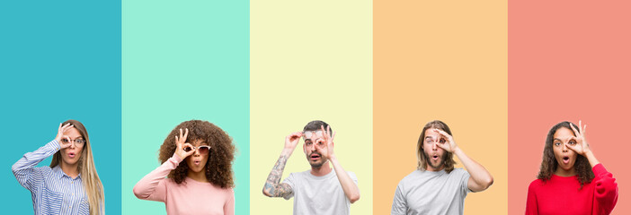 Obraz premium Collage of group of young people over colorful vintage isolated background doing ok gesture shocked with surprised face, eye looking through fingers. Unbelieving expression.