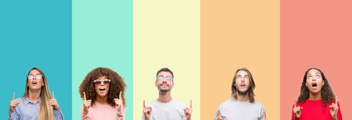 Collage of group of young people over colorful vintage isolated background amazed and surprised...