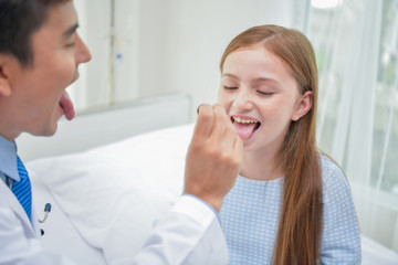 Fototapeta premium Health Concepts. The doctor is examining the health of the child. Children are happy in the hospital.