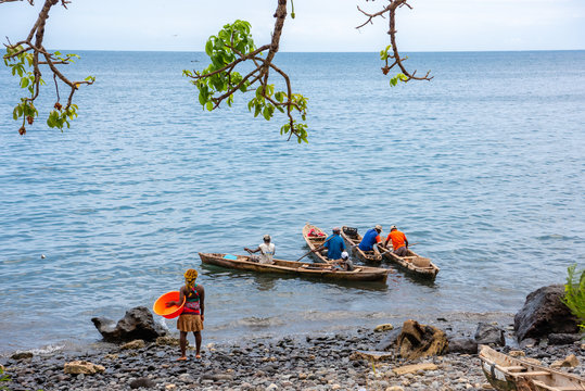 Fishing Village on the sea in Sao Tome and Principe. Mountains like Pico Cão Grande. Travel to Sao Tome and Principe. Beautiful paradise island in Gulf of Guinea. Former colony of Portugal.