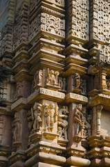 Fototapeta na wymiar VISHWANATH TEMPLE, Carved deities, vyalas and surasundaries on wall, Western Group, Khajuraho, Madhya Pradesh, UNESCO World Heritage Site