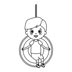 cute little boy playing in swing