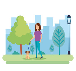 young woman with dog in the park