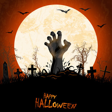 halloween zombie hand in front of full moon
