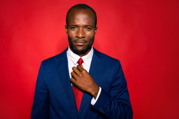 Portrait of content calm handsome well-groomed mulato rich wealt