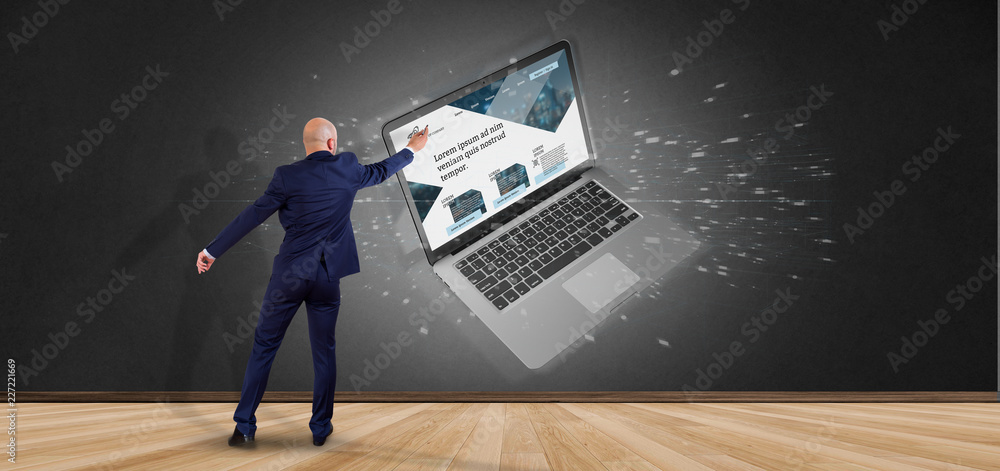 Poster businessman in front of a laptop with business website template on the screen isolated on a backgrou