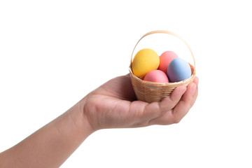 Colored easter eggs with kid hand isolated on white