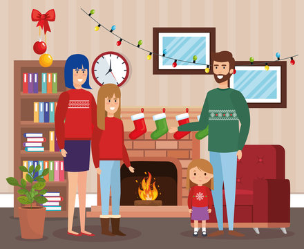 parents and kids with december clothes in livingroom