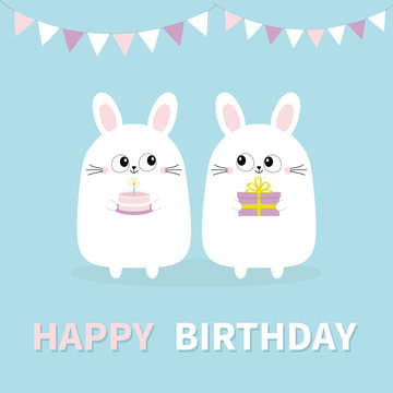 Happy Birthday. White bunny rabbit holding gift box, cake. Paper flags. Funny head face. Big eyes. Cute kawaii cartoon character. Baby greeting card template. Blue background. Flat design.