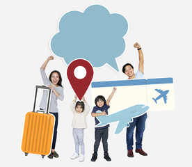 Cheerful family holding travel icons and ticket