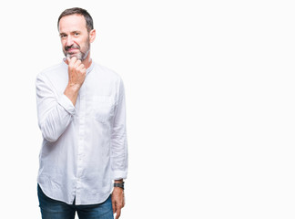 Fototapeta premium Middle age hoary senior man over isolated background looking confident at the camera with smile with crossed arms and hand raised on chin. Thinking positive.