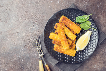 Crumbed fish fingers