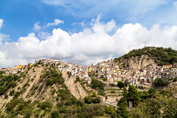 Fototapeta na wymiar Panoramic view of Motta Camastra, a village in Sicily not far from Taormina, perched on the top of a hill in the valley of the Alcantara River