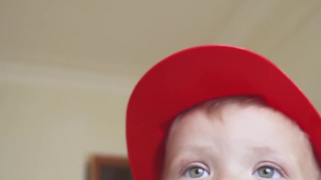 child with hard hat and construction tools