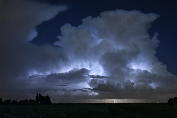 Fototapeta na wymiar Autumn Thunderstorm at the Dutch Coast Illuminated by Lightning