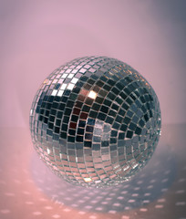 mirror ball.isolated on a dark background. photo with copy space