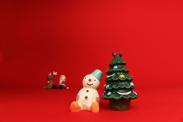 Still life of snowman and decoration of Christmas tree