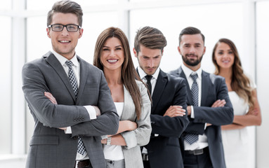 professional business team standing next to the office window