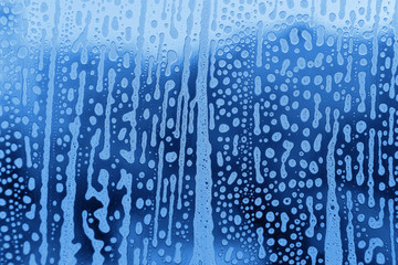 Soap foam pattern on glass