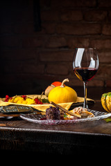 Deer steak on a black background. A Halloween Meal.