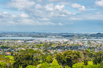A view of Ohehunga suburb with the Mangere bridge in the background - 227250600