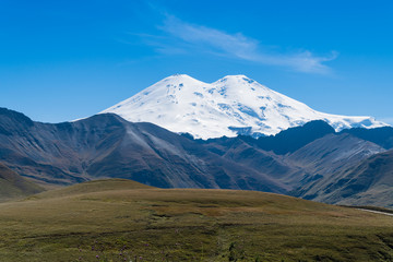 Beautifull landscape view of the mount Elbrus - the highest mountain in Europe. Caucasus mountains at autumn season time.