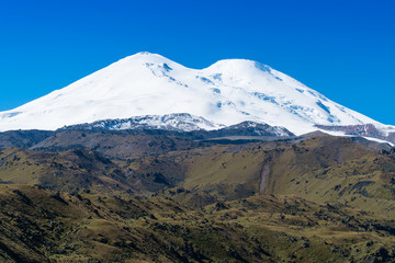 Fototapeta premium Beautifull landscape view of the mount Elbrus - the highest mountain in Europe. Caucasus mountains at autumn season time.