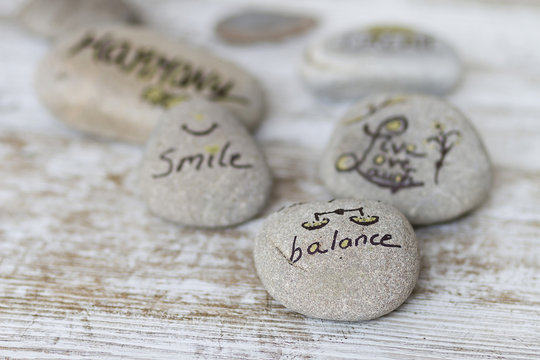 Life phylosophy words on stones