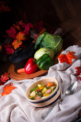 delicious autumnal vegetable soup with sausage and bacon