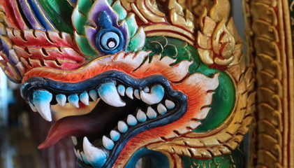 Mythical Naga's head details at Thai temple