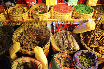 Dried teas and spices in baskets on the traditional market