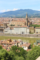 Fototapeta premium cityscape view of Florence or Firenze city Italy - Palazzo Vecchio and Arno river view