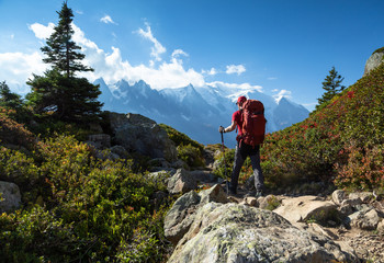 A man hiking on the famous Tour du Mont Blanc near Chamonix, France. - obrazy, fototapety, plakaty