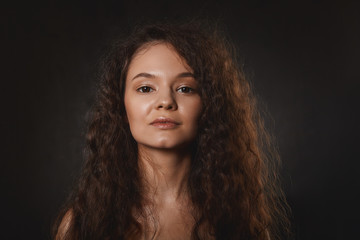 Beauty, hair care and femininity concept. Portrait of gorgeous mysterious young Caucasian woman...
