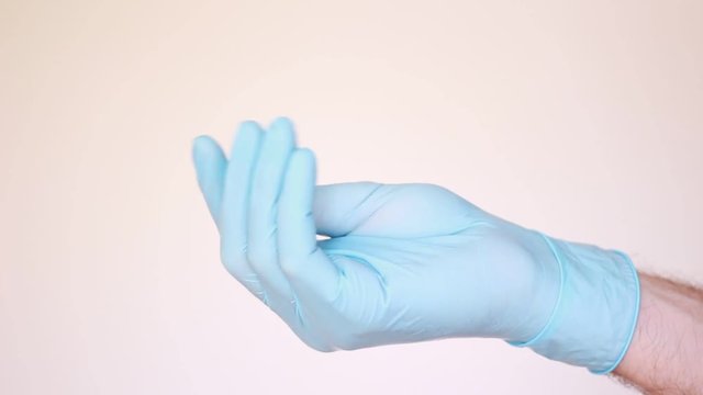 Gesture "Give" in latex gloves